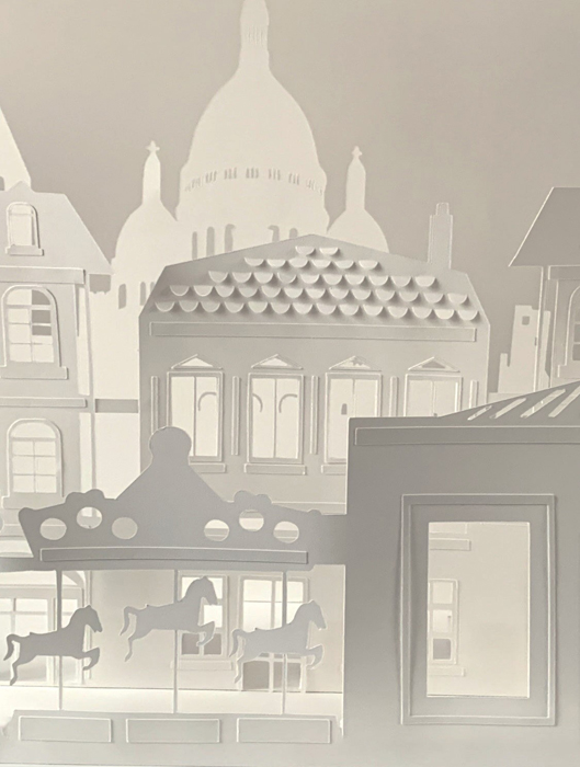 Illustration papier découpé paper cut de Montmartre à Paris avec un manège, poésie du papier pour Sodexo et Air france, Création Laure Devenelle, 2021